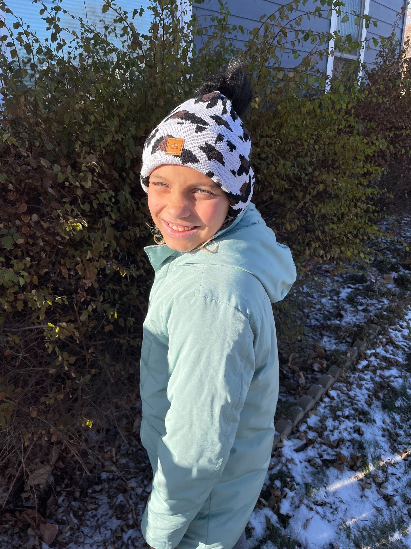 Trendy Fleece Lined Leopard Print Beanie with Faux Fur Pom