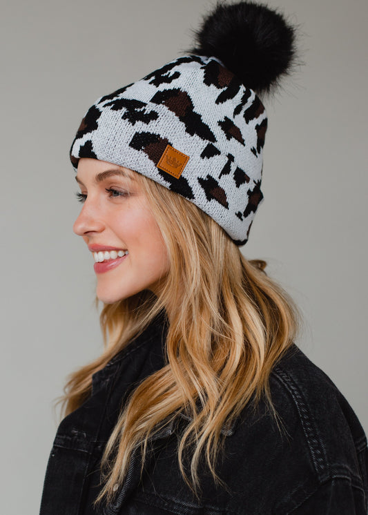 Trendy Fleece Lined Leopard Print Beanie with Faux Fur Pom