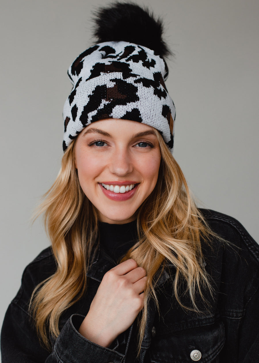 Trendy Fleece Lined Leopard Print Beanie with Faux Fur Pom